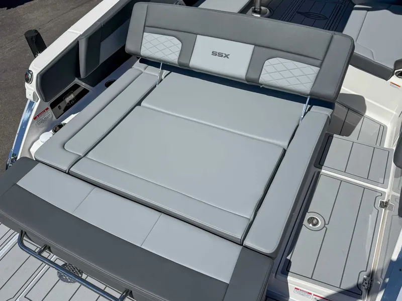 Slide: The Image of Chaparral 2870 SSX 2025 boat rear seat in gray leather. - 11