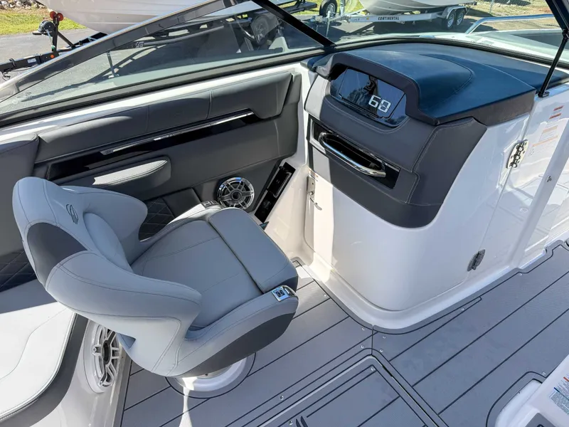 Slide: The Image of Interior of 2025 Chaparral 2870 SSX with gray seat and dashboard. - 17