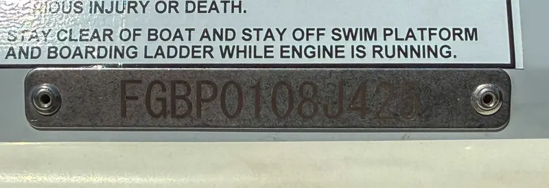 Slide: The Image of Warning label and serial number on Chaparral 2870 SSX boat, year 2025. - 25