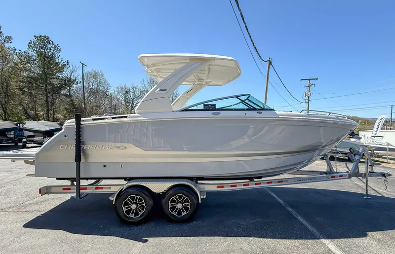 Slide: The Image of 2025 Chaparral 2870 SSX boat on trailer outdoors. - 6