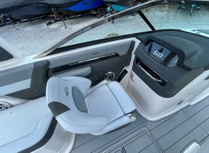 Slide: The Image of Interior of 2025 Chaparral 267 SSX with modern dashboard. - 11