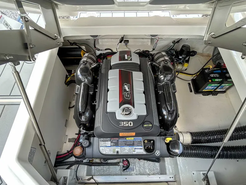 Slide: The Image of 2025 Chaparral 267 SSX engine compartment with Mercury 6.2L 350 engine. - 13