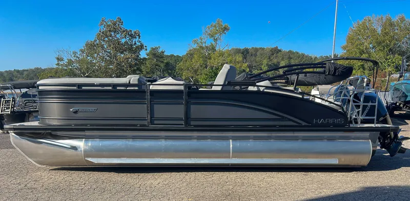 The Image of 2025 Harris Solstice 230 SLDH pontoon boat on parking lot. - 1