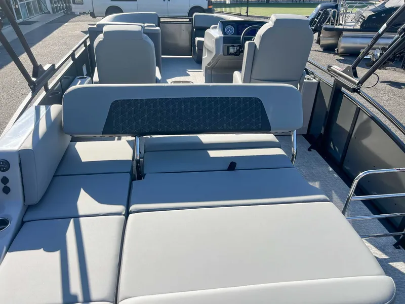 Slide: The Image of Interior of 2025 Harris Solstice 230 SLDH with luxurious seating. - 12