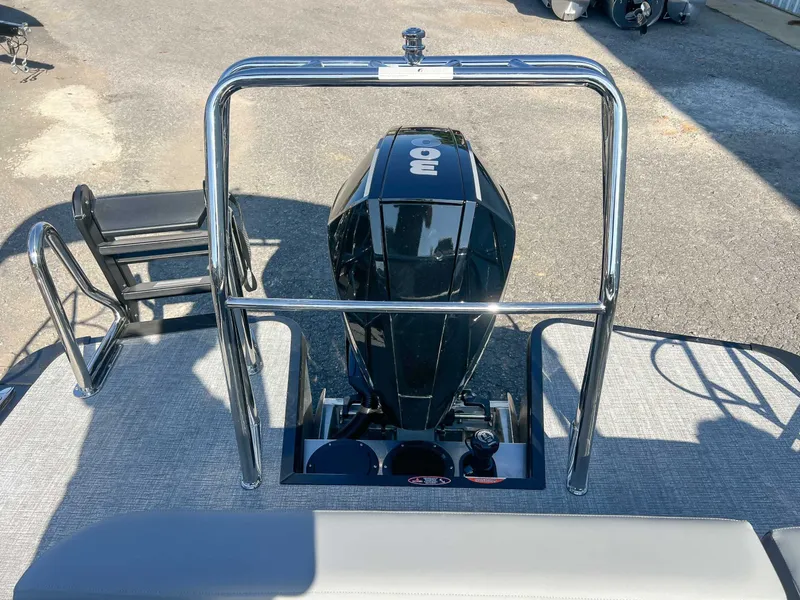 Slide: The Image of 2025 Harris Solstice 230 SLDH with powerful outboard motor. - 23