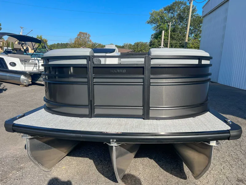 Slide: The Image of Harris Solstice 230 SLDH 2025 pontoon boat on parking lot. - 4