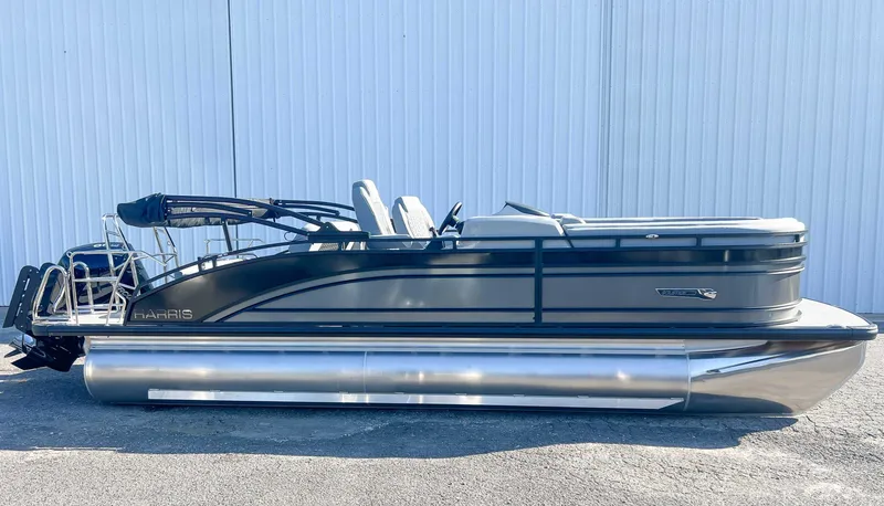 Slide: The Image of 2025 Harris Solstice 230 SLDH pontoon boat against white wall. - 6