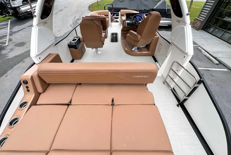 Slide: The Image of Interior of 2025 Harris Grand Mariner 230 SLDH with luxurious seating. - 10