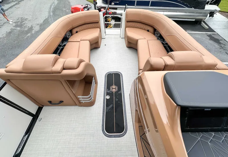 Slide: The Image of Interior of 2025 Harris Grand Mariner 230 SLDH with luxurious leather seating. - 11