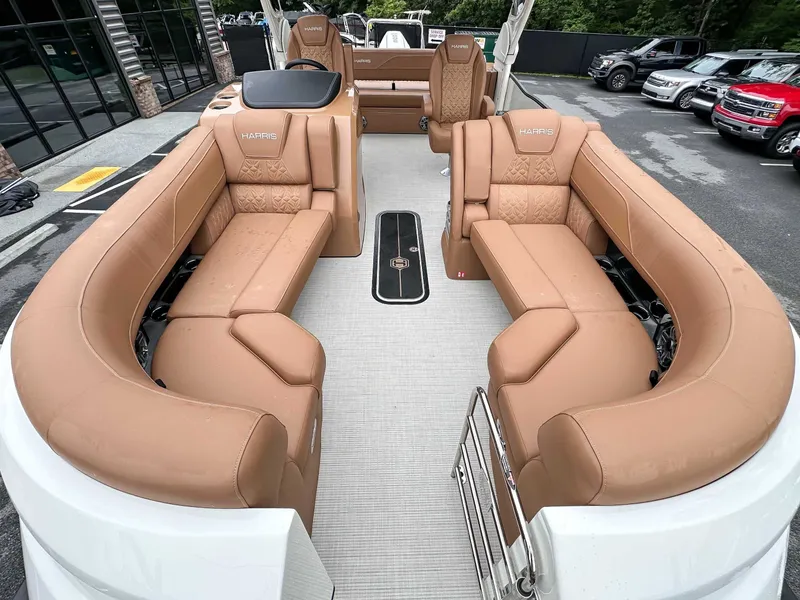 Slide: The Image of Interior of 2025 Harris Grand Mariner 230 SLDH with luxurious leather seating. - 12