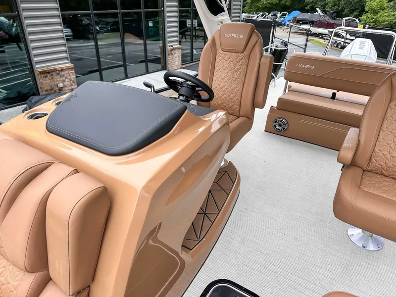 Slide: The Image of Interior of 2025 Harris Grand Mariner 230 SLDH with luxurious seating. - 16