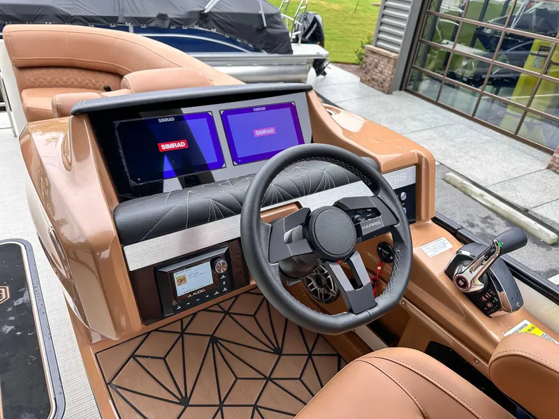 Slide: The Image of Harris Grand Mariner 230 SLDH 2025 helm with Simrad displays. - 19