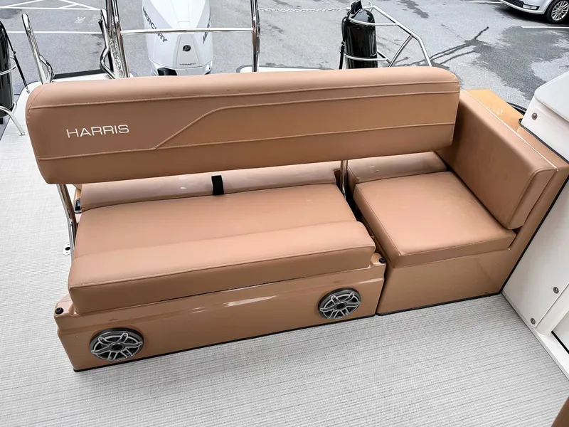 Slide: The Image of Harris Grand Mariner 230 SLDH 2025, brown leather seating with speakers. - 24