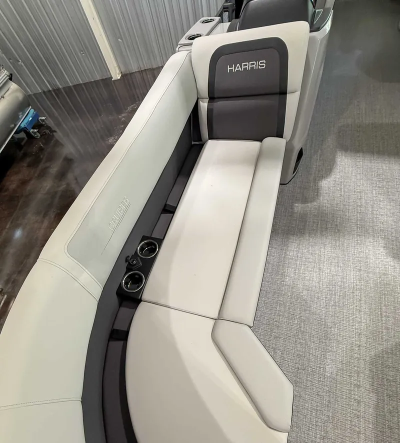 Slide: The Image of Interior of 2025 Harris Cruiser 230 CWDH with gray seating. - 11
