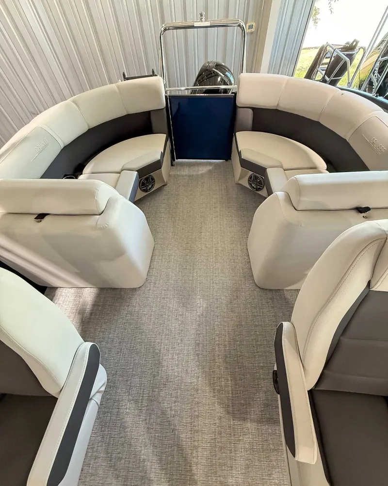 Slide: The Image of Interior of 2025 Harris Cruiser 230 CWDH with luxurious seating. - 18