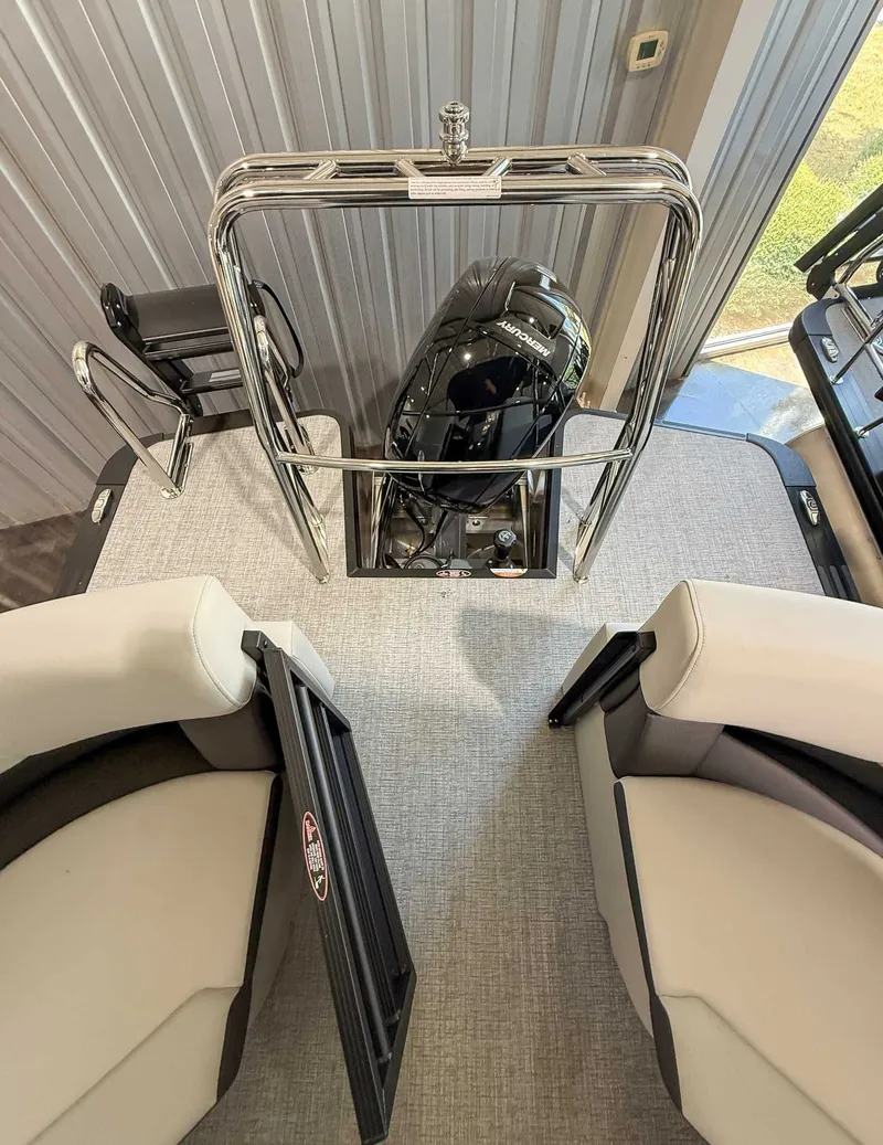 Slide: The Image of Interior of 2025 Harris Cruiser 230 CWDH with engine view. - 19