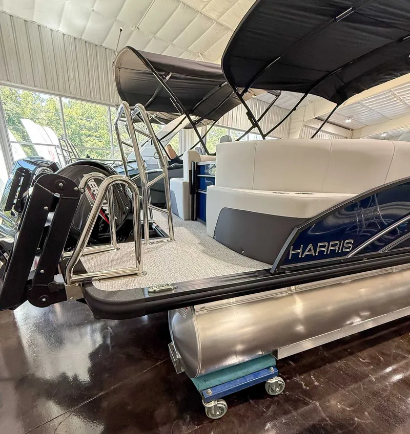 Slide: The Image of Harris Cruiser 230 CWDH 2025 in showroom with luxurious interior. - 7