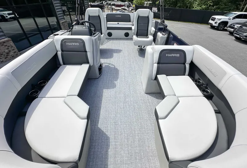 Slide: The Image of Interior of 2026 Harris Cruiser 210 SLDH with luxurious seating. - 13