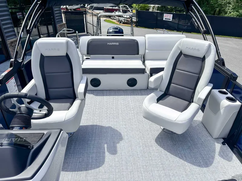 Slide: The Image of Interior of 2026 Harris Cruiser 210 SLDH with luxurious seating. - 14