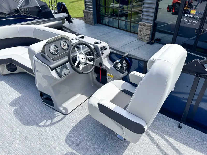 Slide: The Image of Interior of 2026 Harris Cruiser 210 SLDH with helm console. - 16