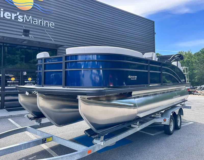 Slide: The Image of Harris Cruiser 210 SLDH 2026 on trailer at Skier's Marine. - 3