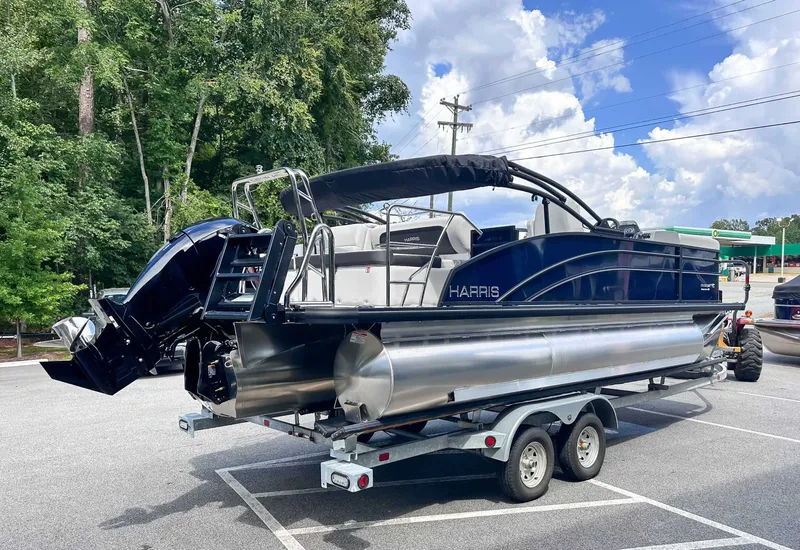 Slide: The Image of Harris Cruiser 210 SLDH 2026 parked on trailer outdoors. - 6