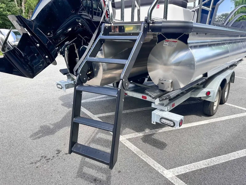 Slide: The Image of 2026 Harris Cruiser 210 SLDH on trailer with ladder. - 9