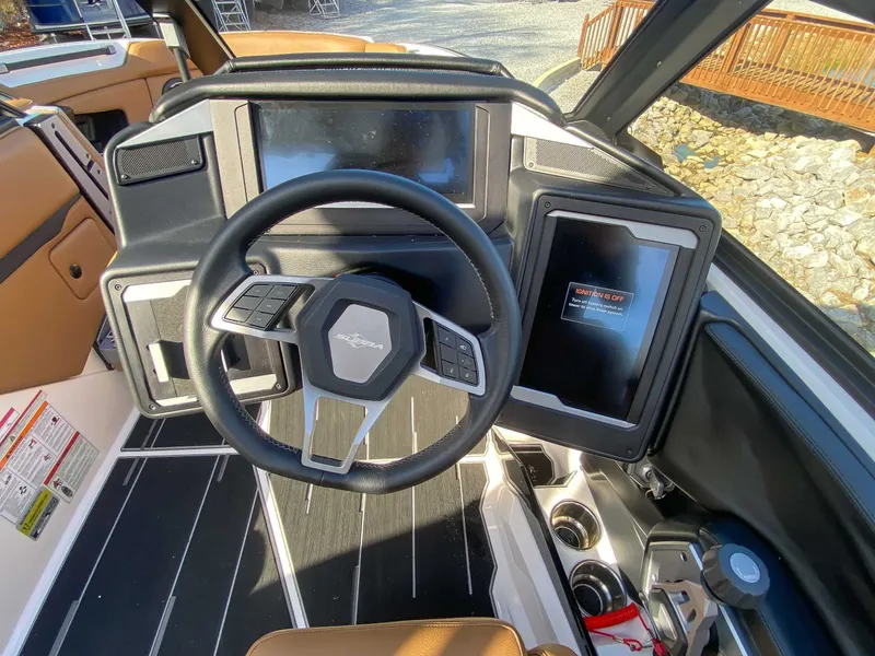 Slide: The Image of 2024 Supra SL interior with modern dashboard and steering wheel. - 19