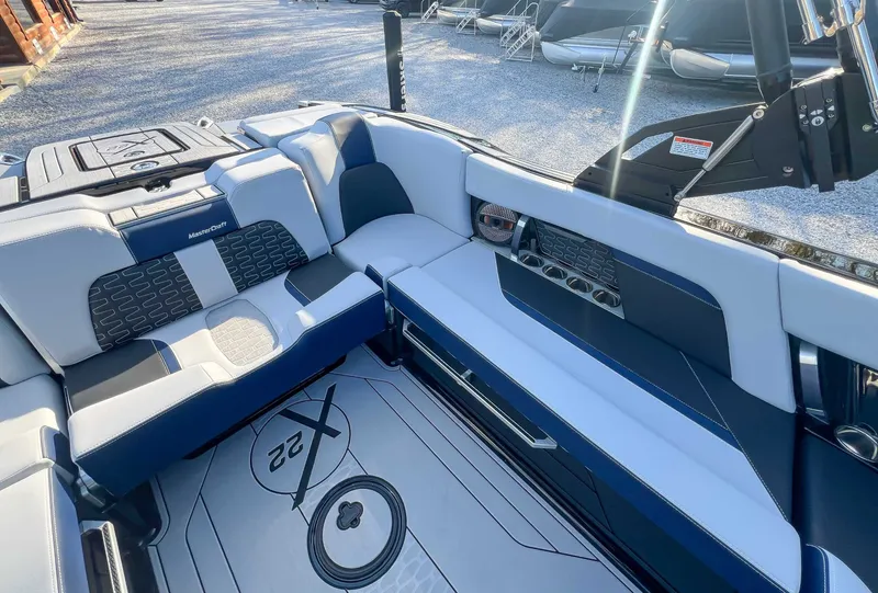 Slide: The Image of 2024 MasterCraft X22 interior with luxurious seating. - 24