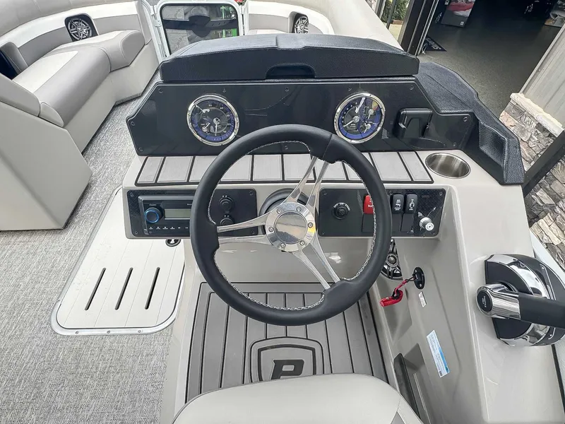 Slide: The Image of Interior view of 2024 Premier 230 SunSation RF boat cockpit. - 10