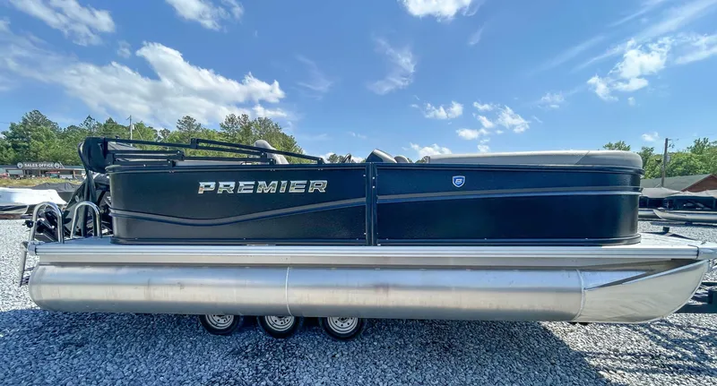 The Image of 2025 Premier 200 Sunscape RF pontoon boat on gravel lot. - 1