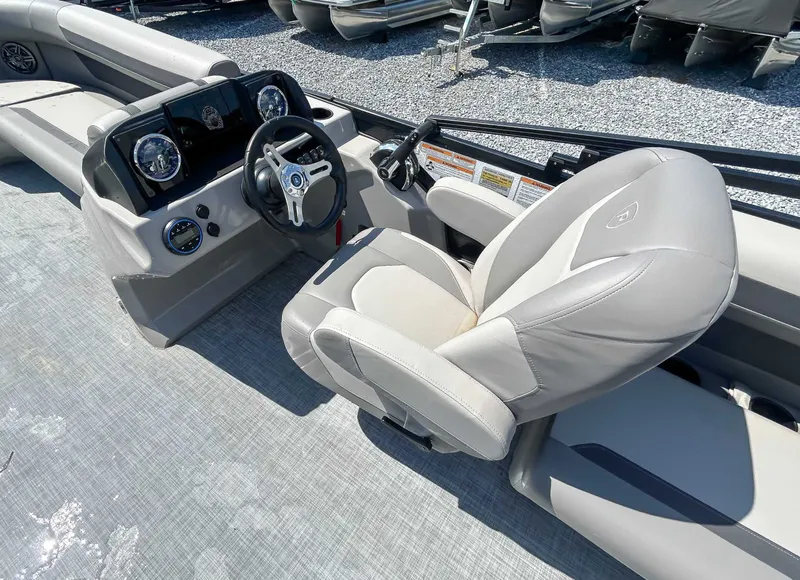 Slide: The Image of Interior of Premier 200 Sunscape RF 2025 with steering console. - 14