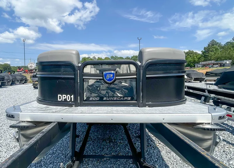 Slide: The Image of Premier 200 Sunscape RF 2025 on a trailer, blue sky. - 4