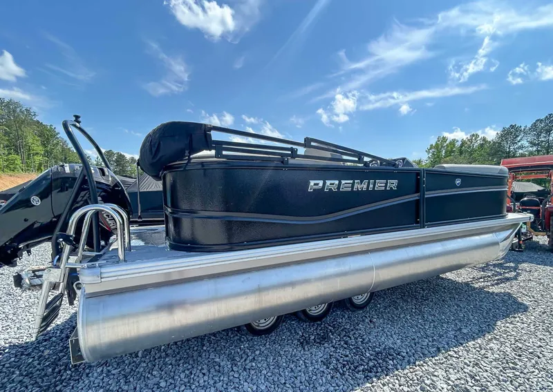 Slide: The Image of 2025 Premier 200 Sunscape RF pontoon boat on gravel lot. - 7