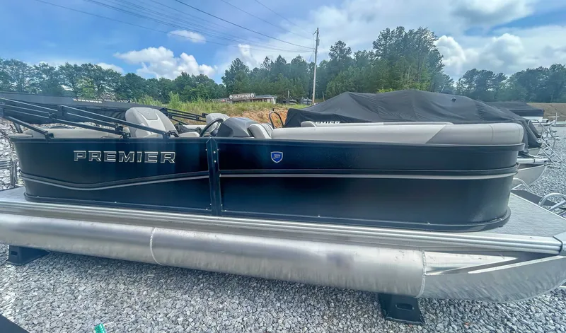 The Image of 2025 Premier 200 Sunscape RF pontoon boat on gravel lot. - 1