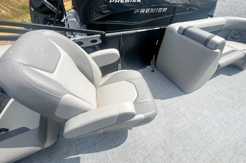 Slide: The Image of Interior of Premier 200 Sunscape RF 2025 with gray seating. - 12
