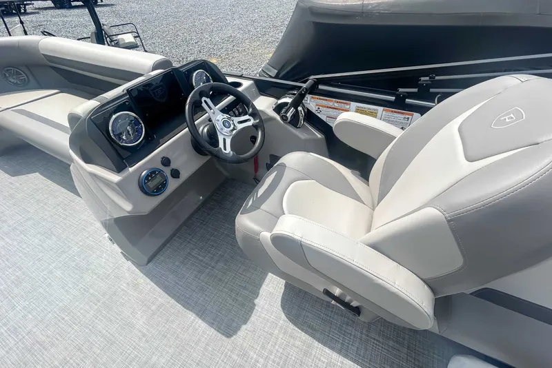 Slide: The Image of Interior of Premier 200 Sunscape RF 2025 with steering console. - 13