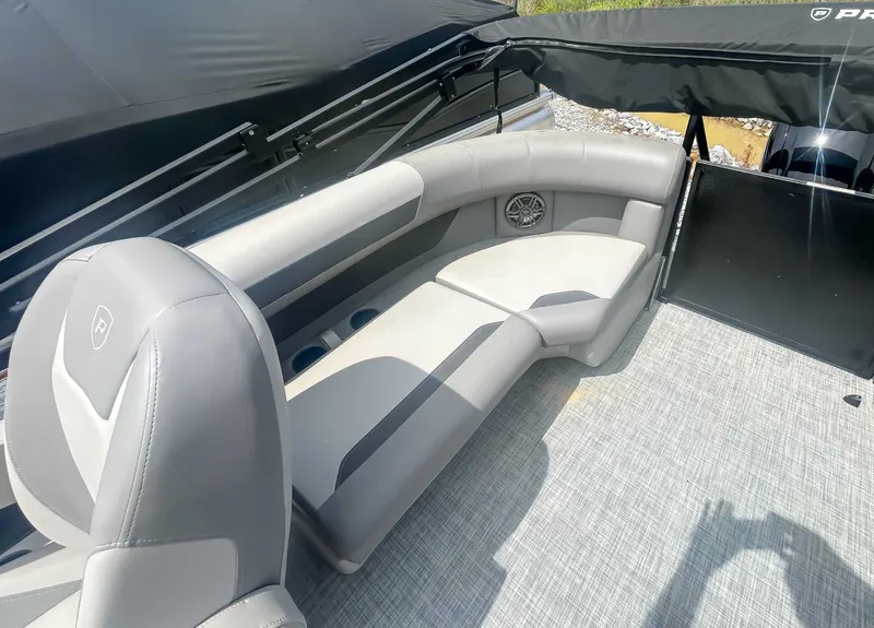 Slide: The Image of Interior of Premier 200 Sunscape RF 2025 with gray seating. - 16