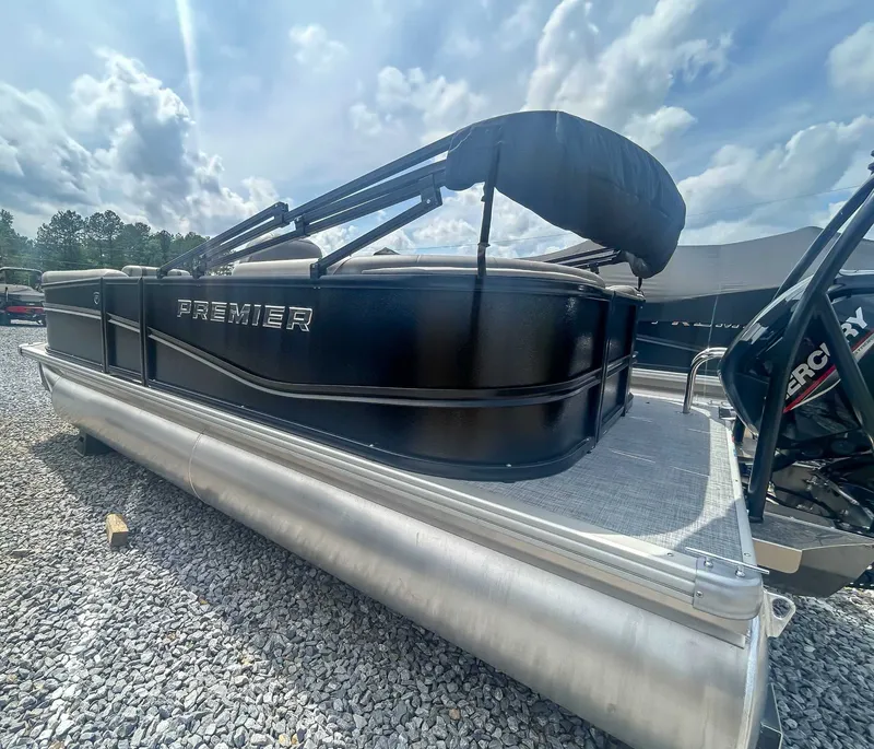 Slide: The Image of 2025 Premier 200 Sunscape RF pontoon boat on gravel. - 6