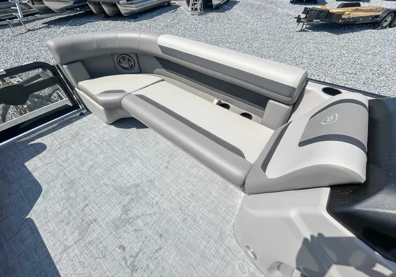 Slide: The Image of Interior of Premier 220 SUNSCAPE RL 2025 with gray upholstery. - 13