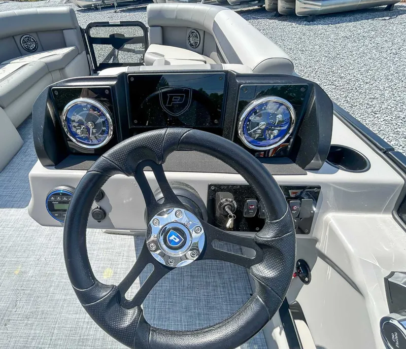 Slide: The Image of Steering wheel and dashboard of Premier 220 SUNSCAPE RL 2025. - 16
