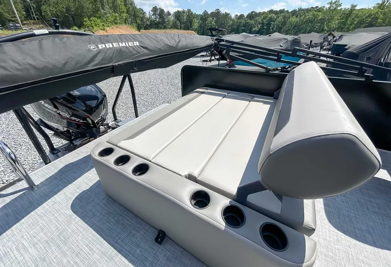 Slide: The Image of Premier 220 SUNSCAPE RL 2025 boat with seating and cup holders. - 19