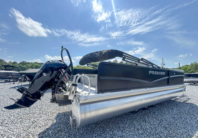 Slide: The Image of 2025 Premier 220 SUNSCAPE RL pontoon boat on gravel lot. - 8