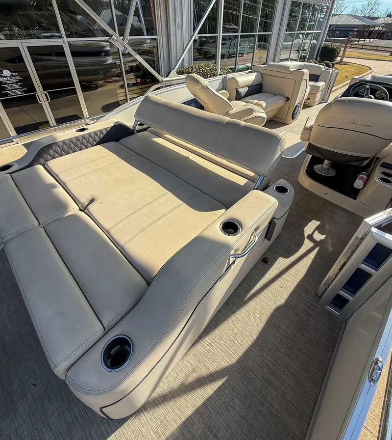 Slide: The Image of 2018 Barletta L23UC boat interior with beige seating. - 8