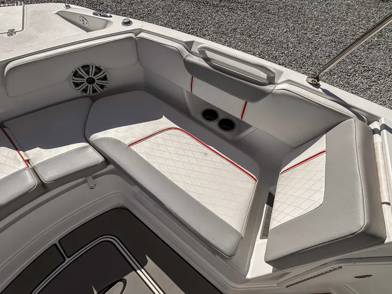 Slide: The Image of 2020 Tahoe 2150 boat interior with cushioned seating. - 11