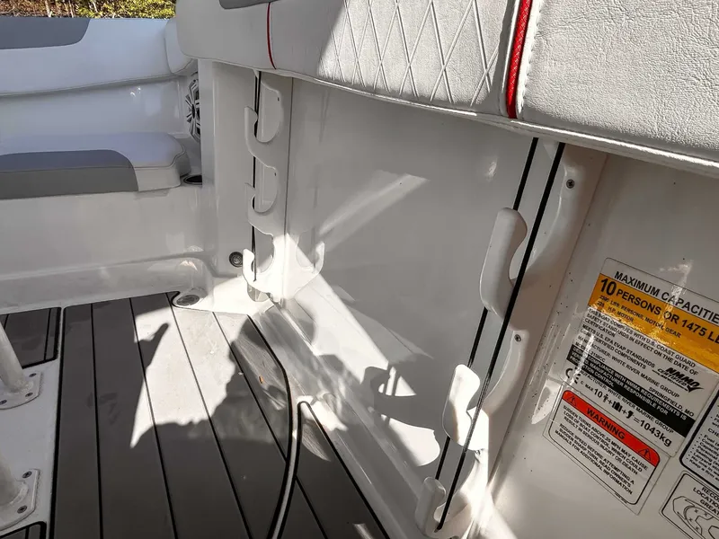 Slide: The Image of Interior of a 2020 Tahoe 2150 boat with seating and capacity label. - 16