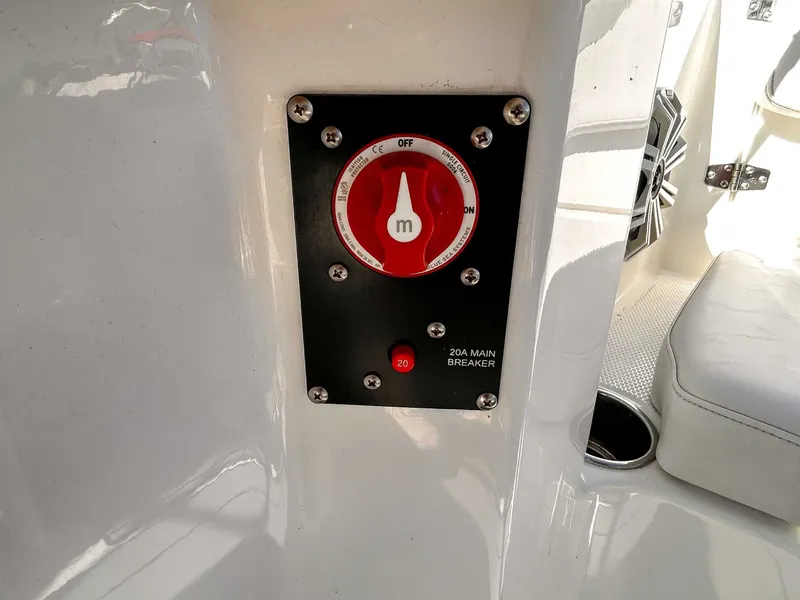 Slide: The Image of Main breaker switch on a 2020 Tahoe 2150 boat. - 19