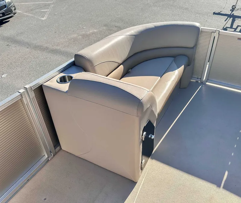 Slide: The Image of Beige seating on Avalon 2223 LS pontoon boat, year 2015. - 13