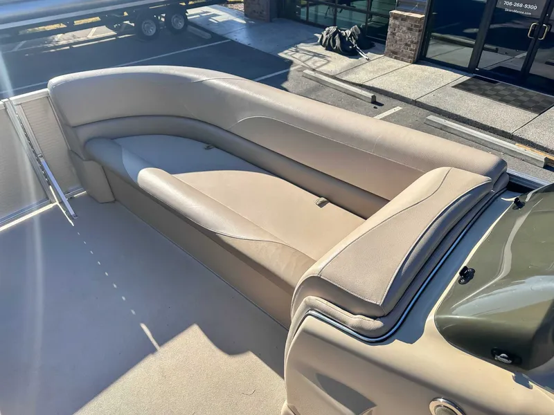 Slide: The Image of 2015 Avalon 2223 LS boat interior seating area. - 14