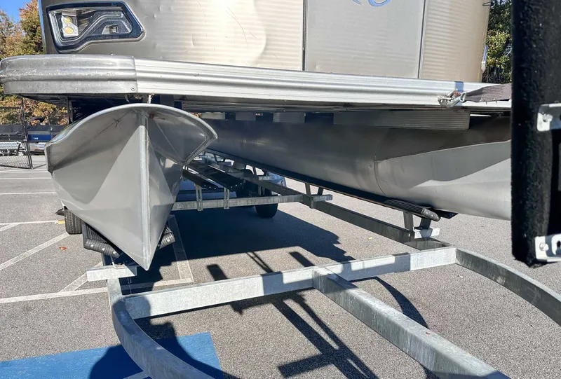 Slide: The Image of Avalon 2223 LS pontoon boat on trailer, year 2015. - 6